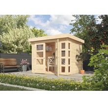 Jardin avec abri de jardin en bois, banc et plantation