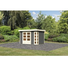 Abri de jardin en bois avec double porte et fenêtres dans le jardin