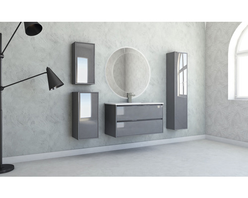 Ensemble de salle de bains moderne avec meuble sous-lavabo, miroir, armoire de toilette et armoire haute devant un mur structuré