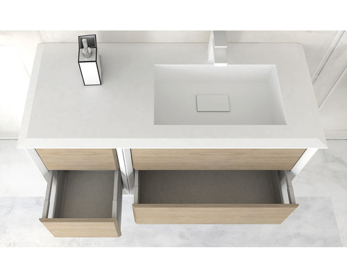 Meuble-lavabo avec deux tiroirs ouverts, lavabo et robinetterie