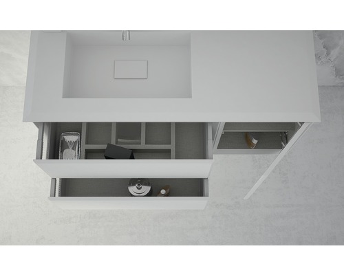 Meuble sous-lavabo avec tiroirs ouverts et espace de rangement