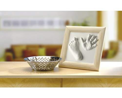 Abdruckset mit Hand- und Fußabdruck sowie einer Schale.