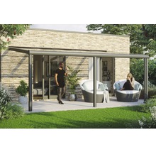 Terrassenüberdachung mit Sitzmöbeln auf einer Terrasse.