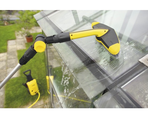 Nettoyeur de vitres utilisé sur une serre