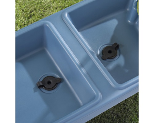 Vue détaillée d''une aire de jeux bleue pour enfants avec deux bassins et des écoulements.