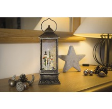 Lanterne décorative avec figurines de bonhomme de neige et effet pailleté pour la période de Noël