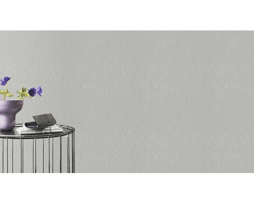 Helle, einfarbige Vliestapete mit feiner Struktur