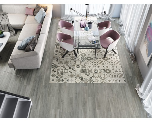 Scène d''intérieur avec canapé, table à manger et carrelage