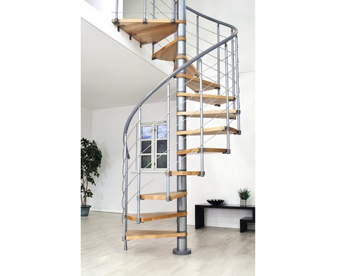 Escalier en colimaçon en bois et métal dans un intérieur.