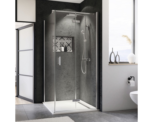 Cabine de douche avec pomme de tête et douchette à main dans une salle de bain moderne