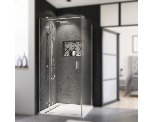 Cabine de douche avec douche de tête et douchette à main dans une salle de bain au design moderne.