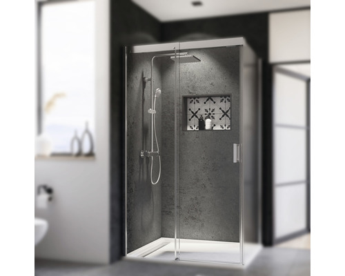 Cabine de douche avec douche à effet pluie et compartiment de rangement dans une salle de bains moderne.