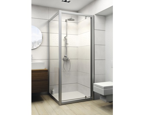 Cabine de douche avec système de douche dans une salle de bain lumineuse