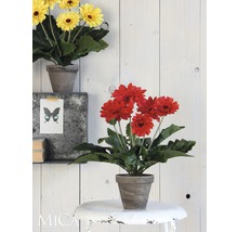 Gerbera artificielle décorative en pot comme décoration de table