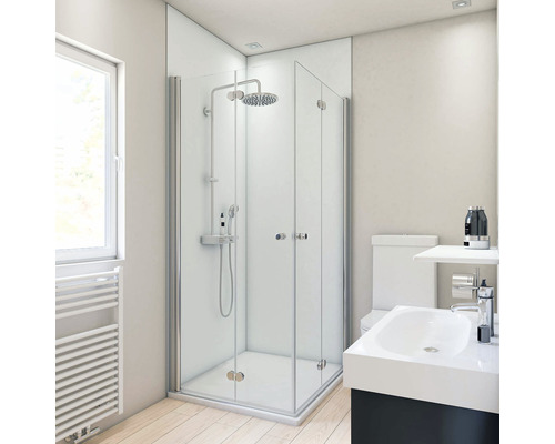 Panneau mural de douche BREUER - uni 210 x 90 cm 9486011000200 Salle de bain lumineuse avec cabine de douche en verre, lavabo et toilettes.