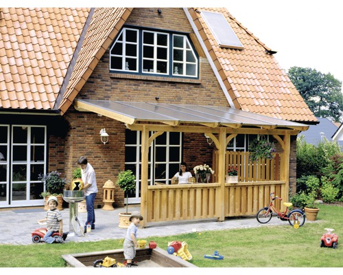 Balustrade, coffrage pour couvercle SKAN HOLZ 220 x 84 cm, douglasie, nature Une famille profite de sa terrasse avec un toit en bois dans le jardin