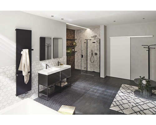 Salle de bain moderne avec douche, lavabo et radiateur