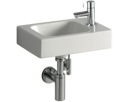 Rechteckiges Waschbecken mit Armatur und Siphon