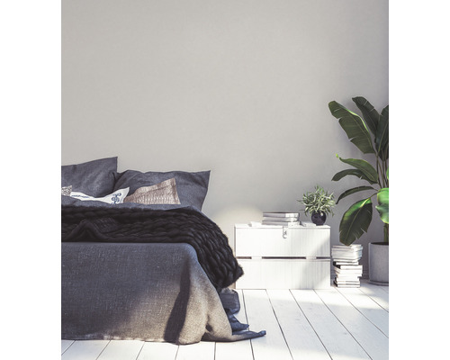 Chambre à coucher avec lit, table de chevet et plantes d''intérieur