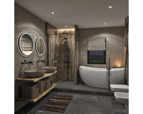 Badezimmer mit Dusche, Badewanne, Waschtisch, Spiegeln und Toilette in hellem Design.