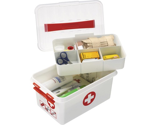 Boîte de premiers secours ouverte avec divers articles médicaux