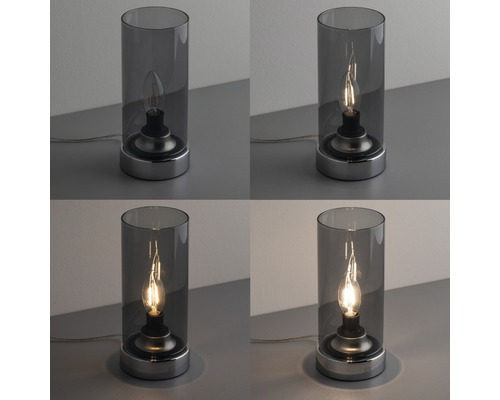 Lampe de table avec abat-jour en verre gris et ampoule allumée