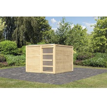 Abri de jardin en bois avec porte et toit plat dans le jardin
