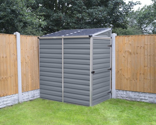Armoire de jardin en métal avec toit à deux pans dans le jardin