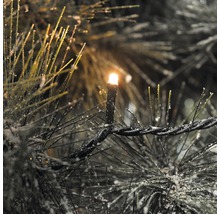 Guirlande lumineuse avec lumière blanc chaud dans le sapin de Noël