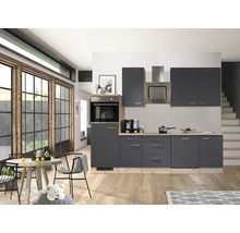 Cuisine moderne avec armoires grises, table à manger et chaises