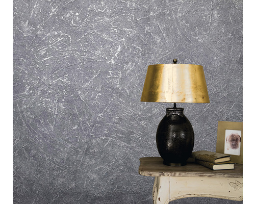 Papier peint structuré gris avec lampe sur une table