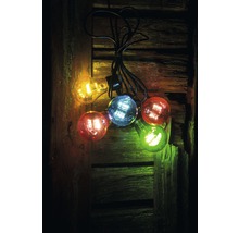 Guirlande lumineuse avec des ampoules colorées sur fond en bois