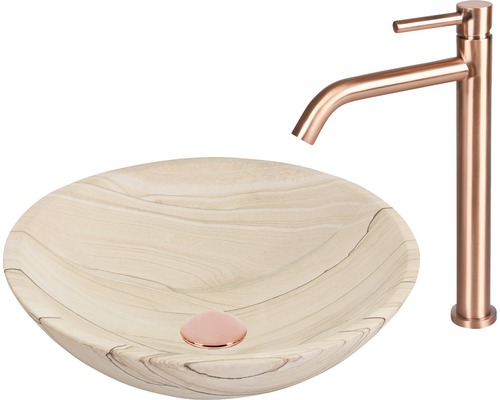 Aufsatzwaschbecken aus Stein mit Armatur