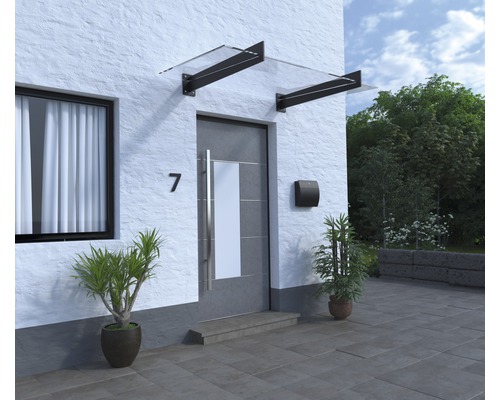 Haustür mit Vordach, Briefkasten und Pflanzen