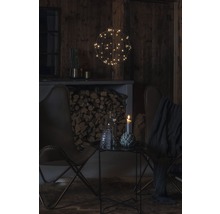 Salon avec décoration et bois de chauffage