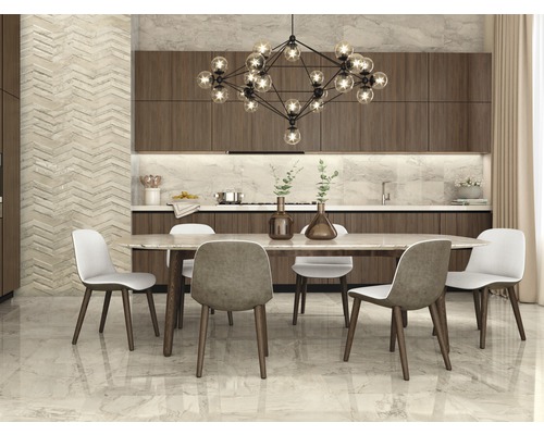 Coin repas lumineux avec table, chaises et éclairage moderne devant une cuisine