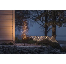 Arbre décoratif avec éclairage extérieur au crépuscule