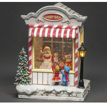 Weihnachtsdekoration mit Süßwarenladen, Weihnachtsmann und Kindern