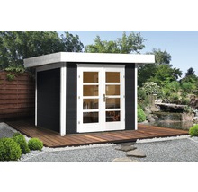 Abri de jardin avec porte double sur terrasse en bois et gravier