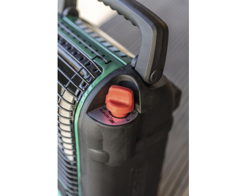 Gros plan d''un radiateur à gaz avec bouton de commande