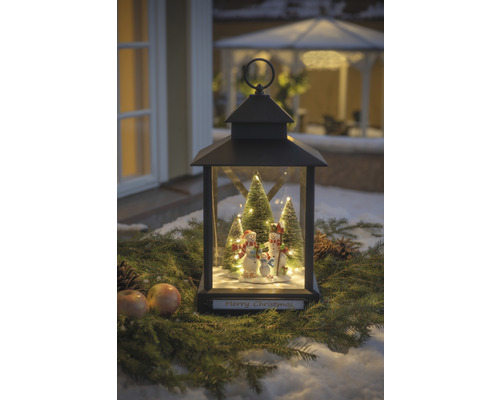 Lanterne décorative avec famille de bonshommes de neige et l''inscription Joyeux Noël pour une ambiance festive