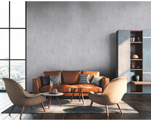 Salon avec canapé, fauteuil, table basse et étagère