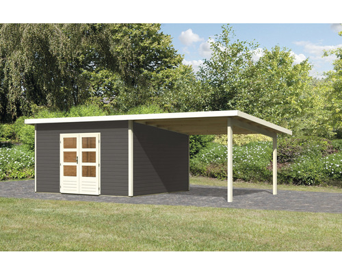 Abri de jardin avec abri voiture et porte double dans le jardin