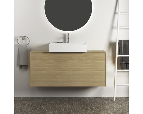 Salle de bains moderne avec meuble sous-lavabo, vasque à poser et miroir rond avec éclairage