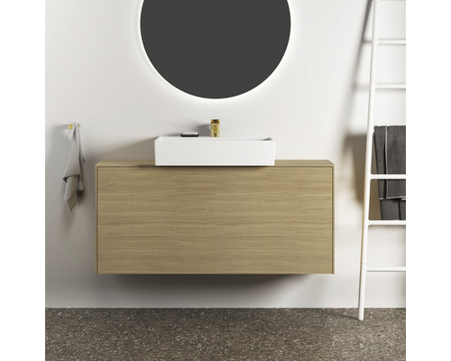 Salle de bains moderne avec meuble-lavabo, vasque à poser, miroir rond et échelle porte-serviettes