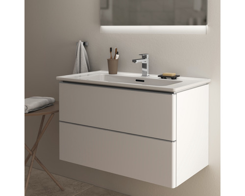 Meuble de salle de bains avec lavabo, deux tiroirs, robinet et miroir