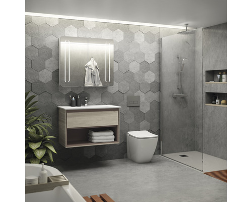 Salle de bain moderne avec meuble-lavabo, armoire de toilette éclairée, cabine de douche et toilettes.