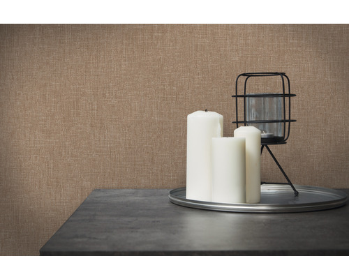 Gros plan d''un papier peint textile marron avec des bougies et des décorations