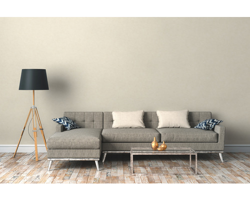 Wohnzimmer mit Ecksofa, Stehlampe und Couchtisch