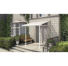 Entrée d''une maison avec un auvent de porte blanc et un banc.